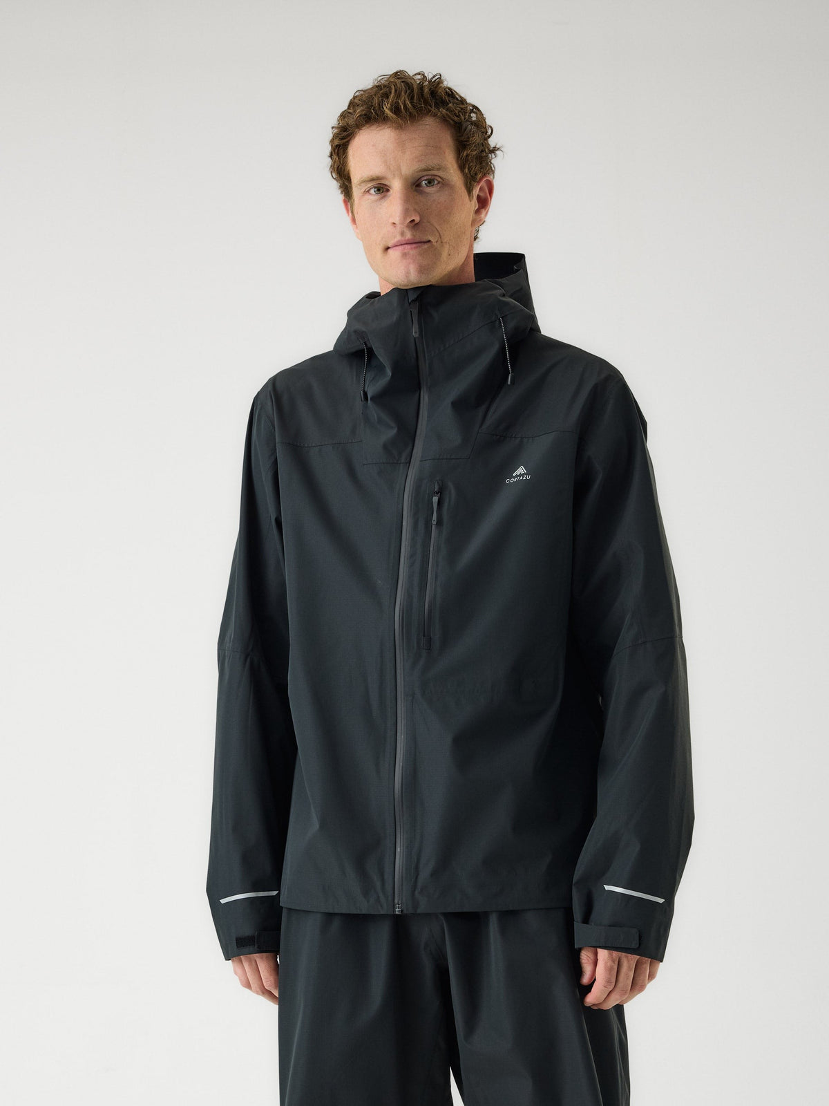 Cortazu Aero Rain Jacket men's in Black, front view on model