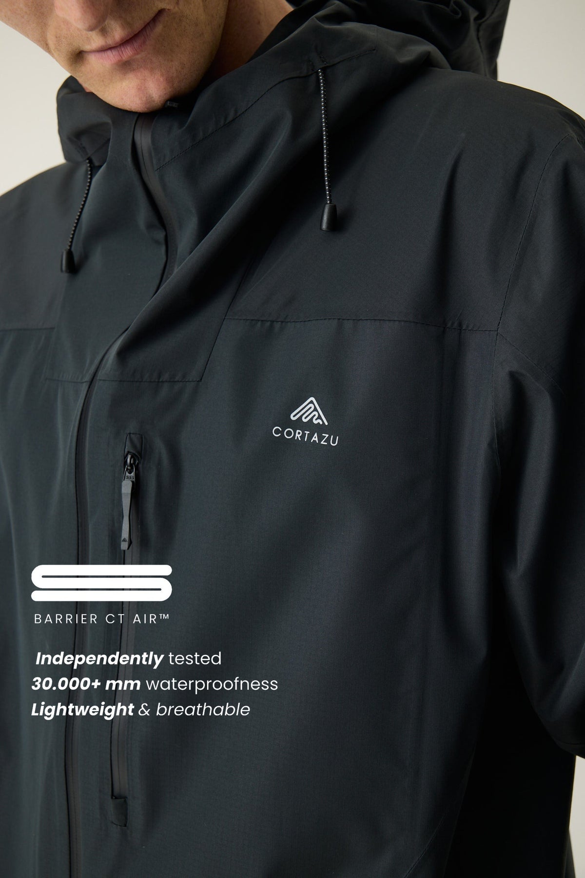 Cortazu Aero Rain Jacket men's in Black, chest detail with Barrier CT Air™ waterproof membrane