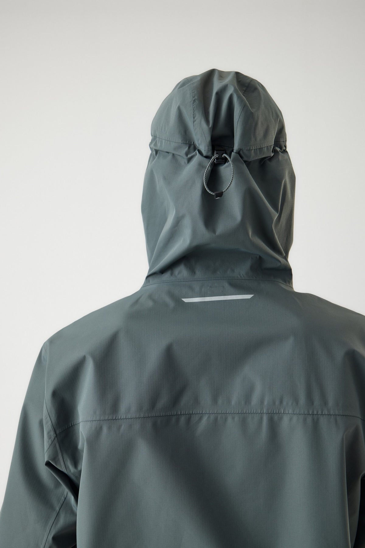 Cortazu Aero Rain Jacket men's in Mid Grey, back view on model