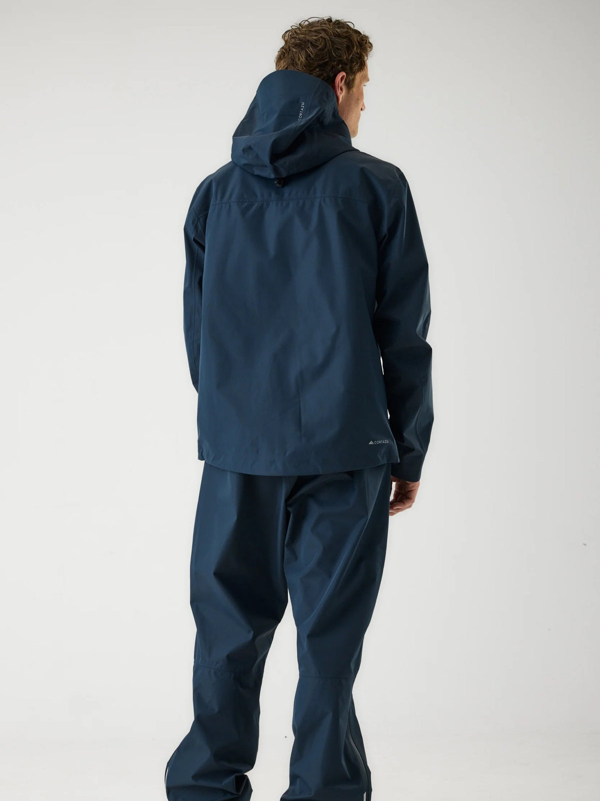 Cortazu Aero Rain Jacket men's in Navy, back view on model