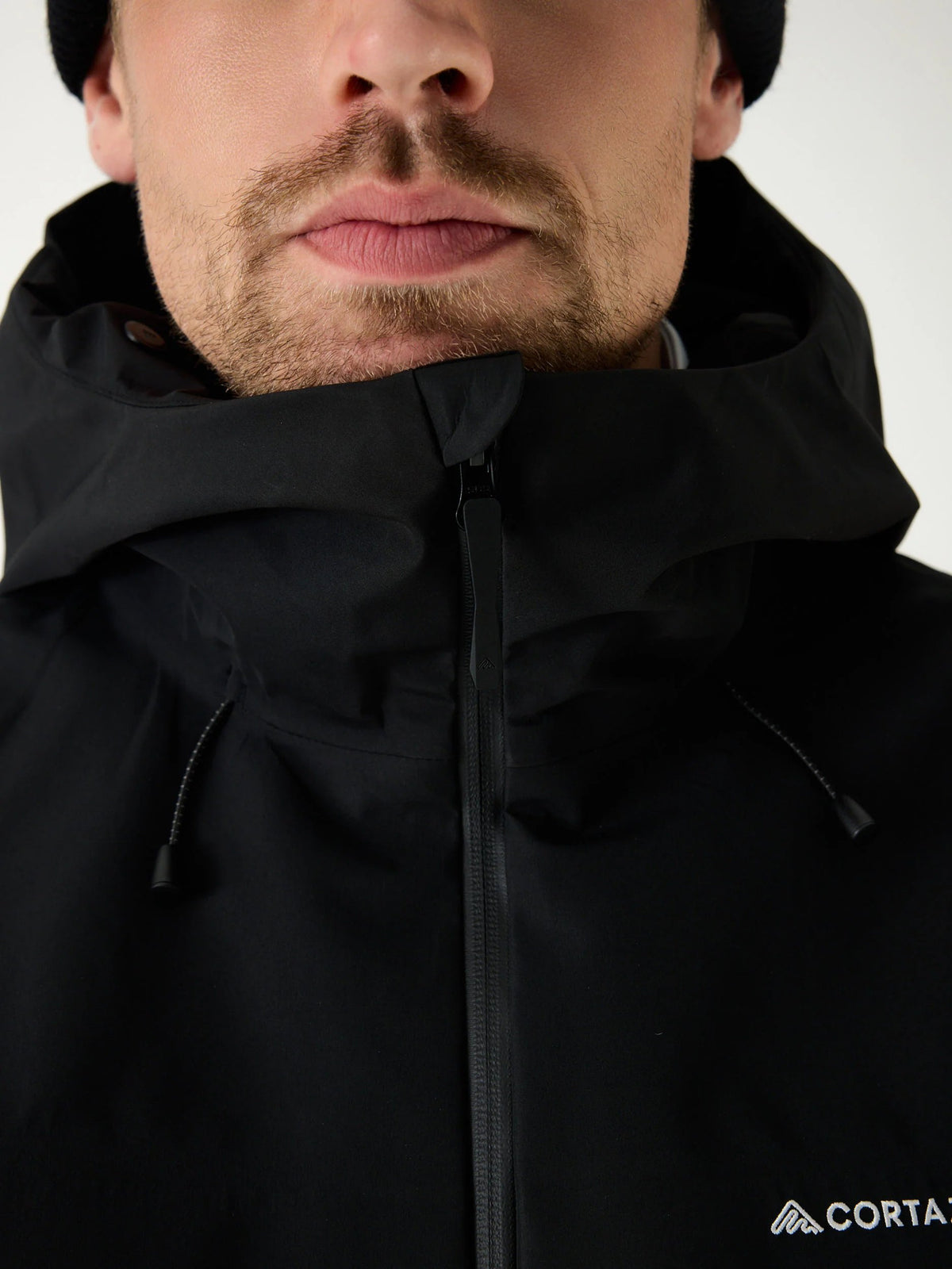 Cortazu Delta INS Shell Jacket men's in Black, front zip close-up