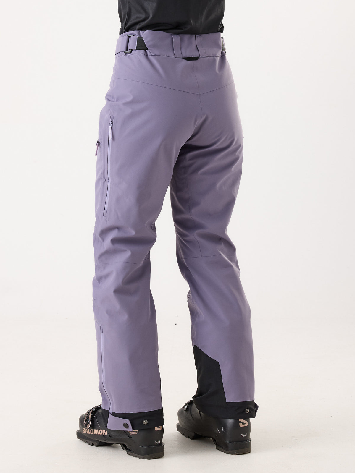 Cortazu Nunatak INS Ski Pants women's in Lavender, back three-quarter view on model